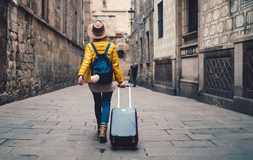 traveler with suitcase
