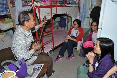 a group of people sitting in a room