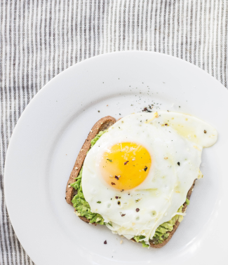 sunny side up on smashed avocado toast