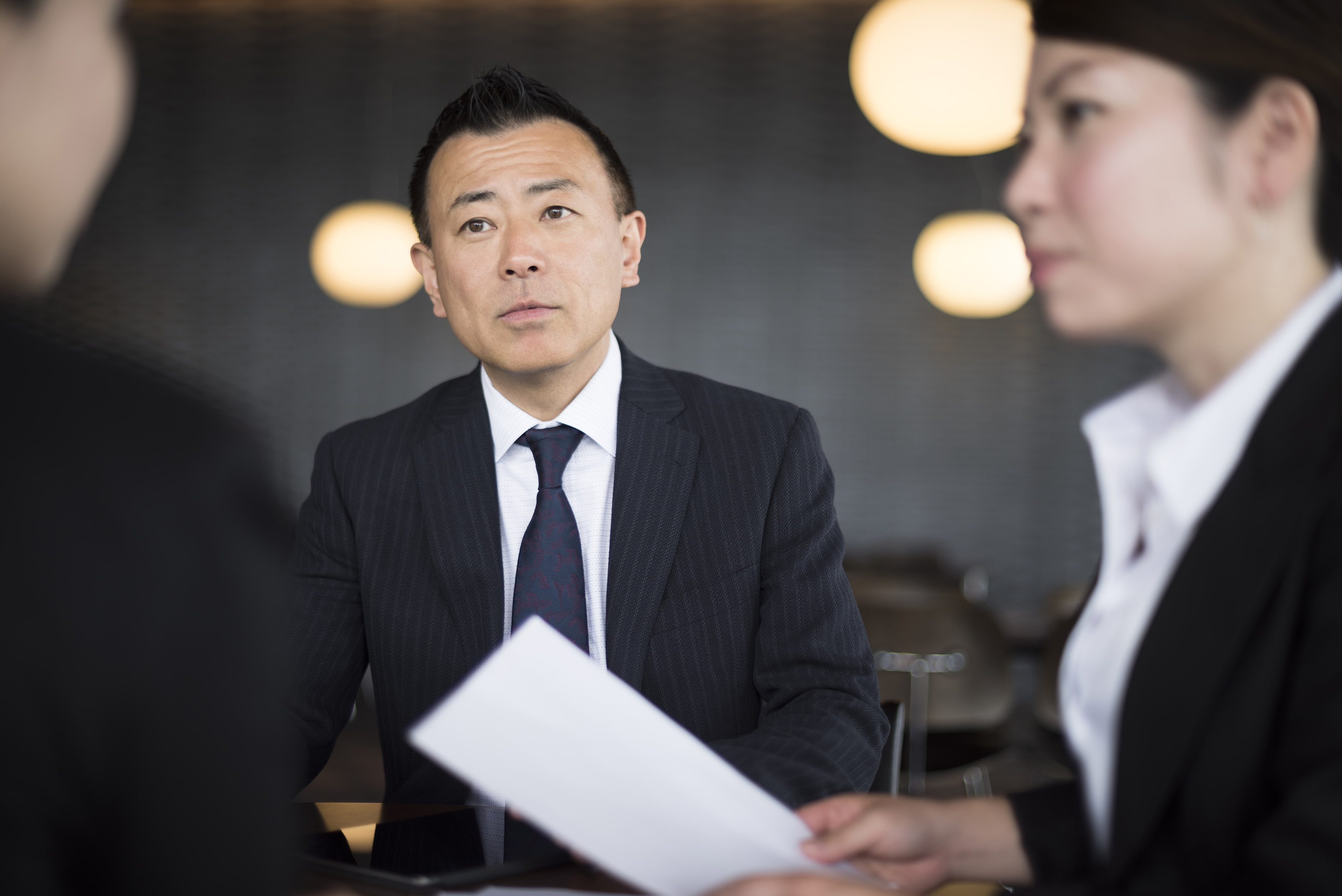 a man wearing a suit and tie