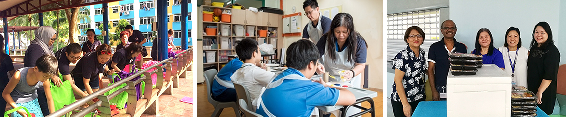 a group of people sitting at a desk