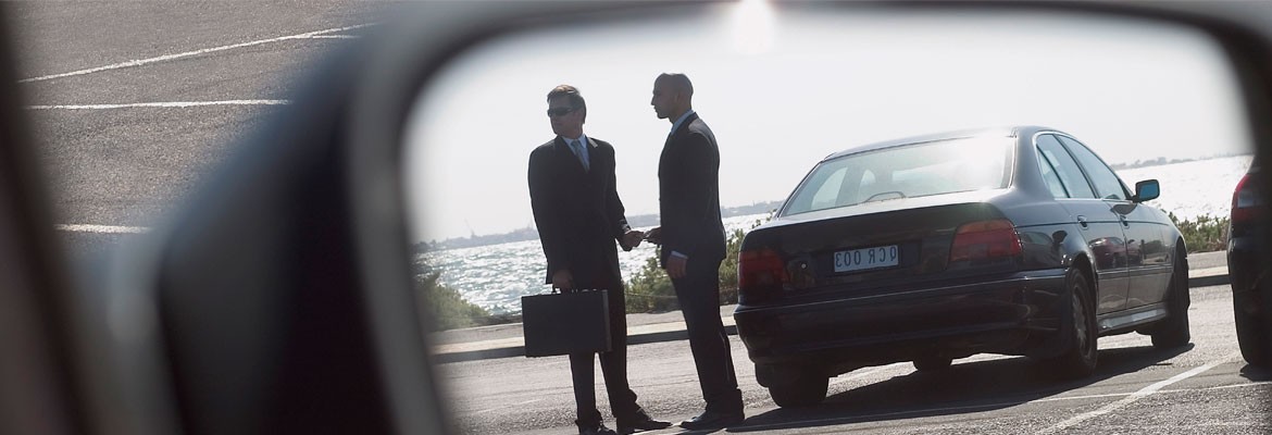 men in suits talking