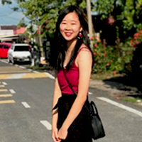 a woman walking down the street