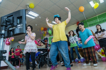 a group of people standing in a room