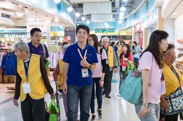 a group of people standing in a room