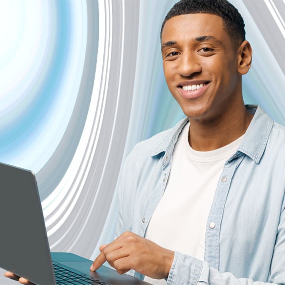 Man purchasing digital insurance for airline ticket on laptop.