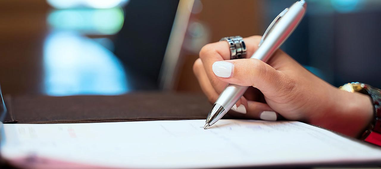 businesswoman signing contract