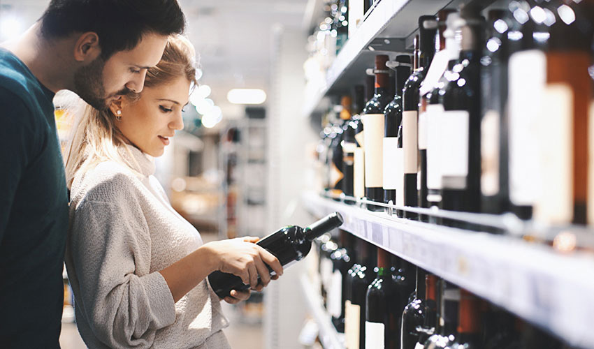 couple buying wine