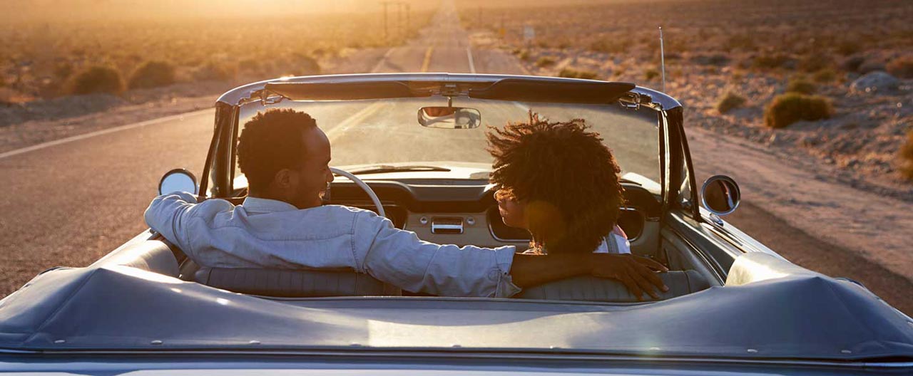 couple in a classic car