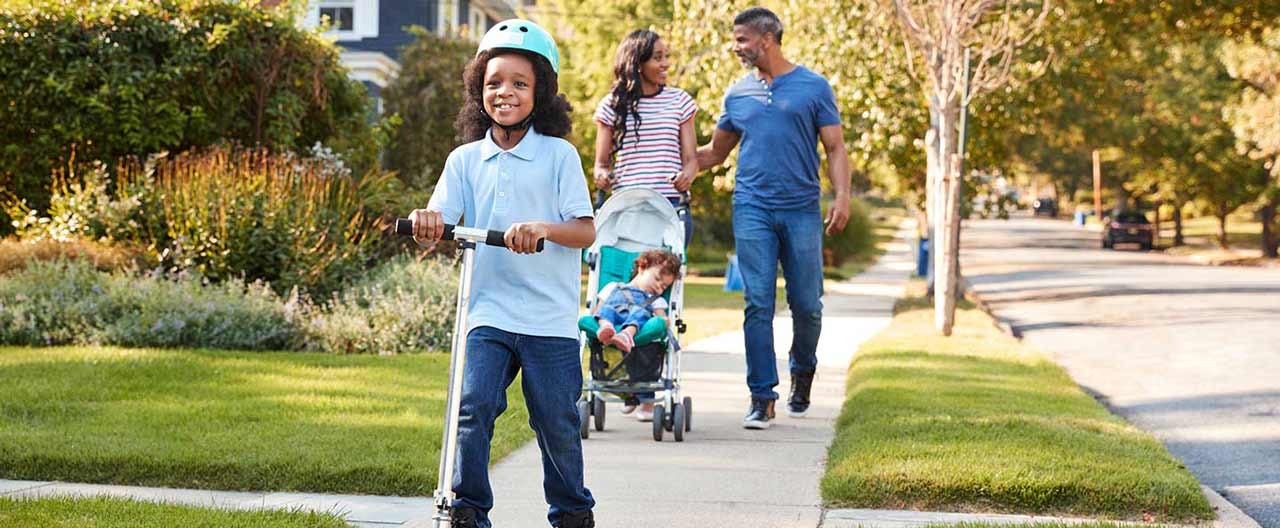 family walking on the street