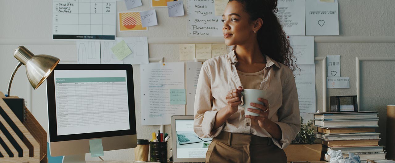 young businesswoman holding coffee